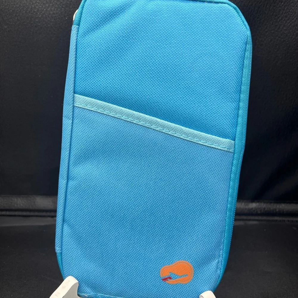 Blue Travel Organizer/ passport holder with Orange Logo